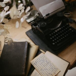 Typewriter and notes on desk