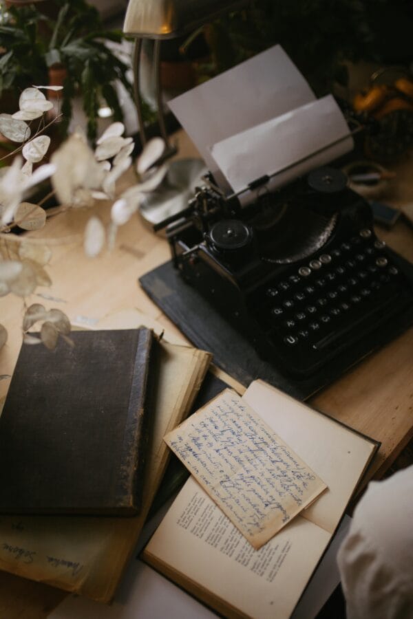 Typewriter and notes on desk